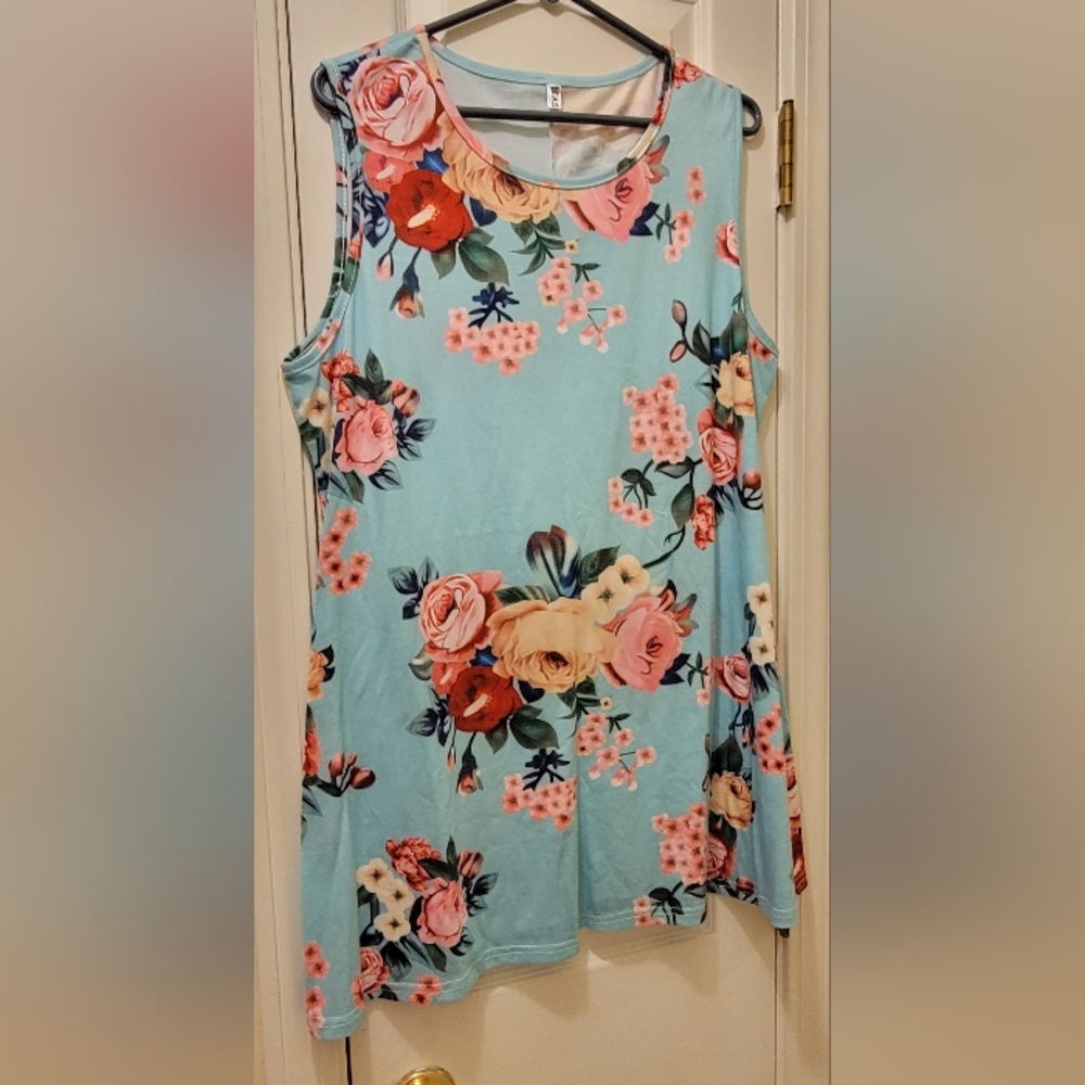 Ceasikery XXL tank top, featuring a floral print on a light blue background.